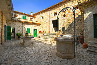 Town house in Mancor de la Vall Mallorca courtyard and well