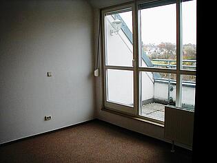 Schlafzimmer mit Balkon