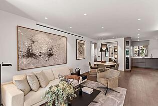 Panoramic view of the dining room, living room and kitchen