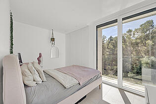 Bedroom with a balcony