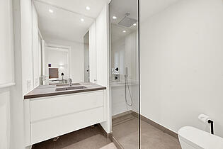 Bathroom in a modern garden apartment for sale