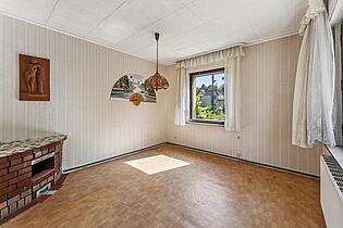 Wohnzimmer mit Kamin