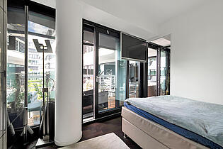 Schlafzimmer mit Balkonzugang